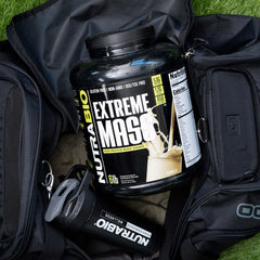 NutraBio Extreme Mass vanilla swirl in glass with rich, inviting texture.
