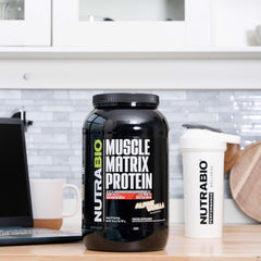 NutraBio Muscle Matrix scoop demonstrates precise portioning for daily protein intake