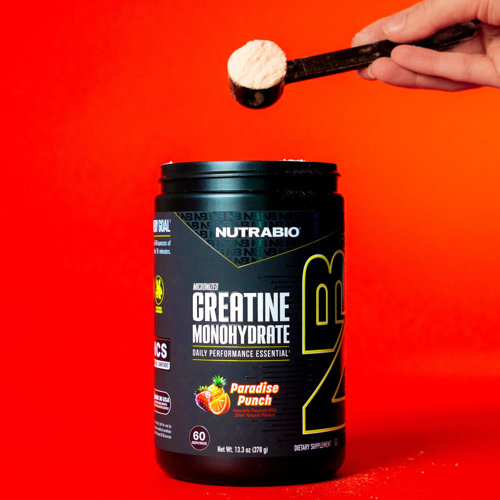 NutraBio Paradise Punch flavor tub ready to mix before a session