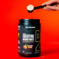 NutraBio Paradise Punch flavor tub ready to mix before a session