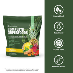 NutraOne greens and reds ingredients displayed with fruits and vegetables.