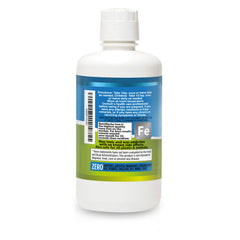 NutriNoche liquid iron drops beside a glass of water for easy intake.