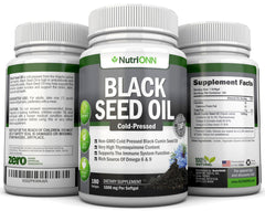 NutriONN Black Seed Oil in hand for skin and nails care