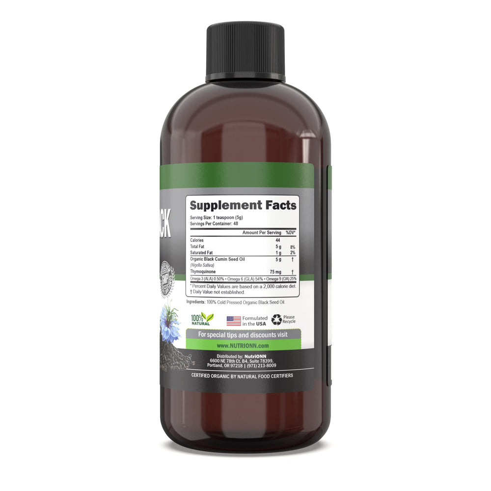 NutriONN Black Seed Oil pouring for easy daily dosing.