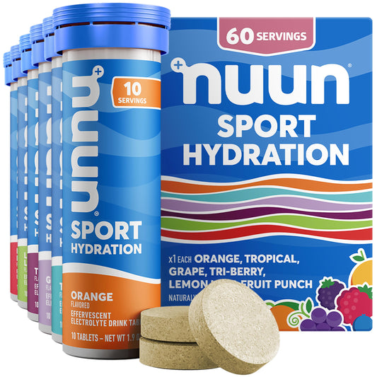 Nuun Sport tablets dissolving in a glass for quick hydration after workouts.