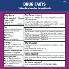 Close-up of Ohm allergy tablets highlighting 180mg dosage for steady relief