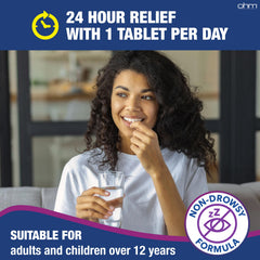 Ohm medicine bottle on a table ready for easy daily dosing