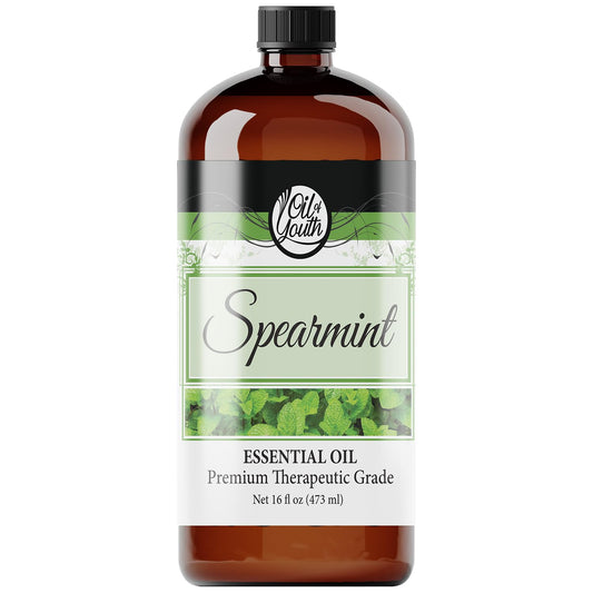 Oil of Youth Spearmint essential oil bottle pour for diffuser ambience.