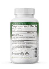 OM Mushroom Reishi capsules in kitchen setting with water