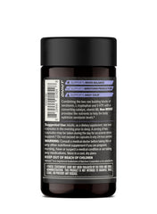 Hands holding ONNIT capsules for daily cognitive and mood routine.