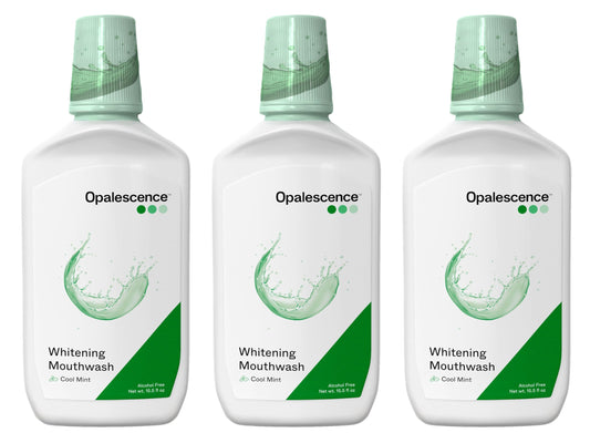 Opalescence whitening mouthwash bottle close-up, premium whitening formula.