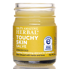 Ora's Amazing Herbal Touchy Skin Salve jar close-up, fragrance-free formula for sensitive skin relief.