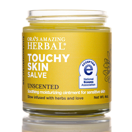 Ora's Amazing Herbal Touchy Skin Salve packaging shown for eczema-friendly daily moisture.