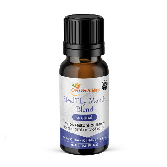 OraWellness Healthy Mouth Blend bottle pour for daily oil-based oral care
