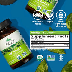 Organic India moringa capsules label, vegan gluten-free wellness capsules.