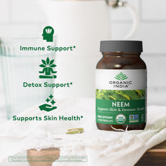 Packaging details on Organic India Neem Leaf Capsules highlight vegan and gluten-free features.