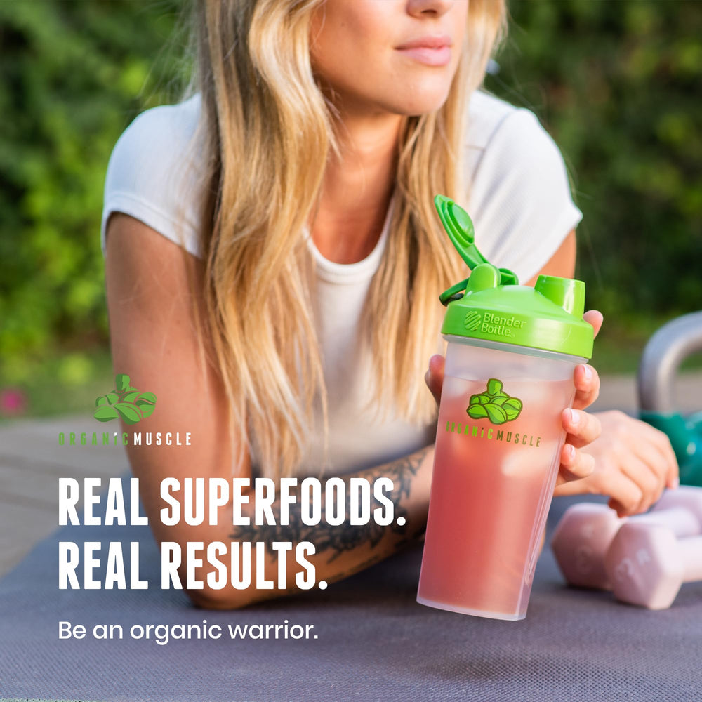 Pomegranate imagery highlights immune-supporting benefits in Organic Muscle Reds Powder.