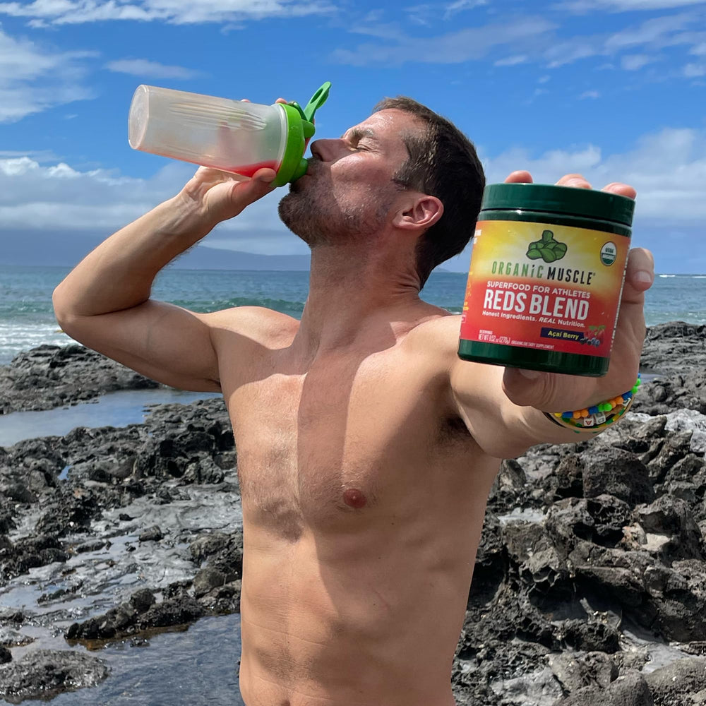 Vegan and non-GMO certification shown with Organic Muscle Reds Powder.