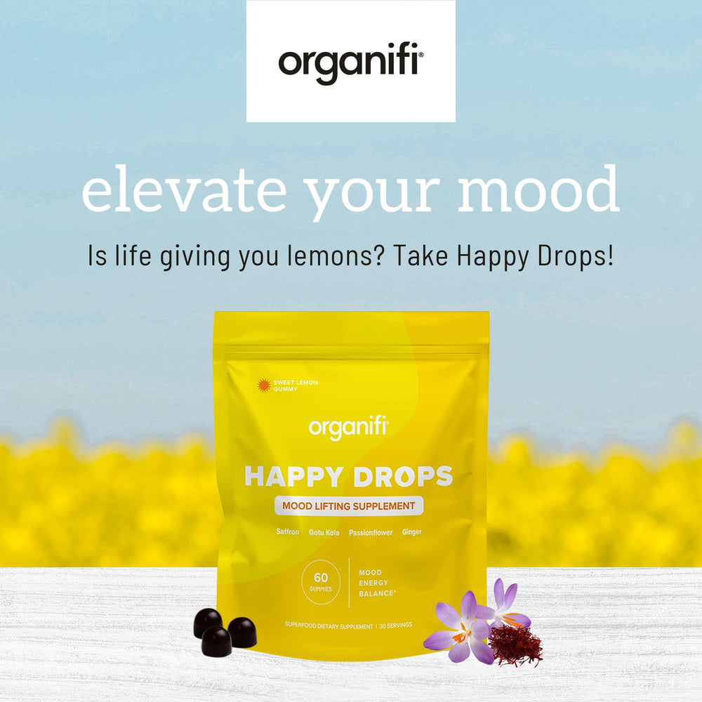 Organifi Happy Drops lemon flavor visual highlighting bright mood-boosting appeal.