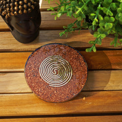 Orgonite Crystal Chakra healing plate balances energy during practice.