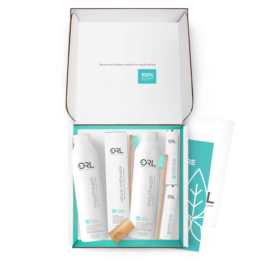Orl Natural 60-Day Kit box on a clean vanity, a complete dental care set