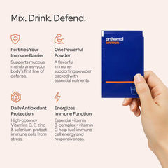 Orthomol Immun glass with mixed drink ready to sip