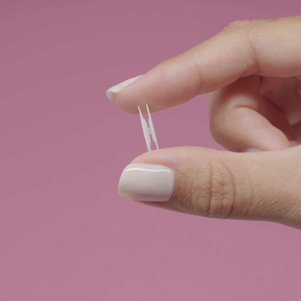 Otostick Baby transparent correctors positioned on baby ears for discreet support
