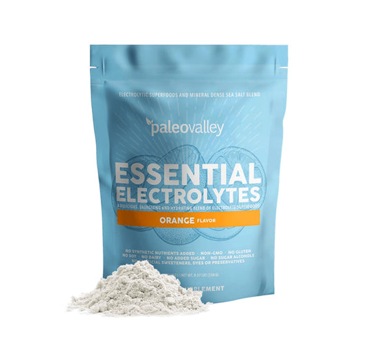 Paleovalley Essential Electrolytes powder mixed in a glass for hydration and energy