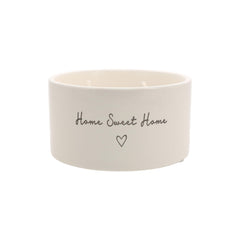 Pavilion Home Sweet Home candle in ceramic vessel with jasmine scent adds elegant ambience.