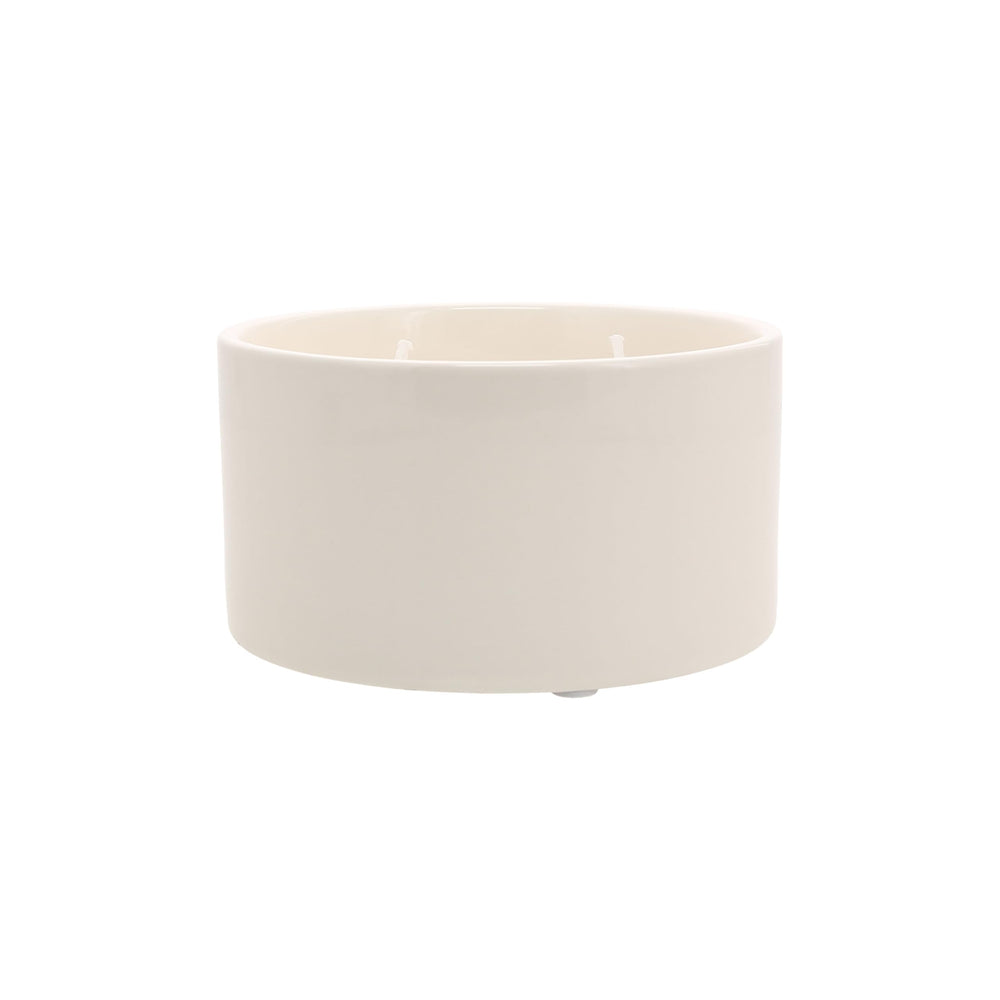 Pavilion candle rests on soft foam feet to protect furniture surfaces.