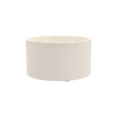 Pavilion candle rests on soft foam feet to protect furniture surfaces.