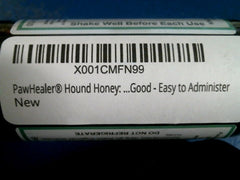 PawHealer Hound Honey dropper ready for dog administration.