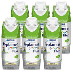 Peptamen Junior Fiber Vanilla powder beside a mixing cup for easy preparation