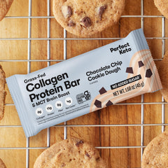 Perfect Keto Collagen Bars held in hand for on-the-go keto snacking.