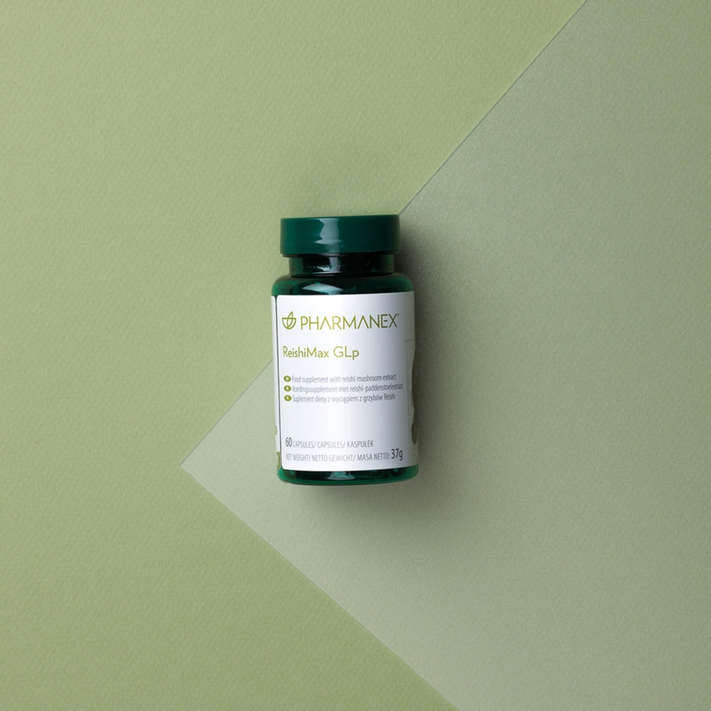Pharmanex ReishiMax GLp cracked-spore technology graphic highlighting enhanced actives.
