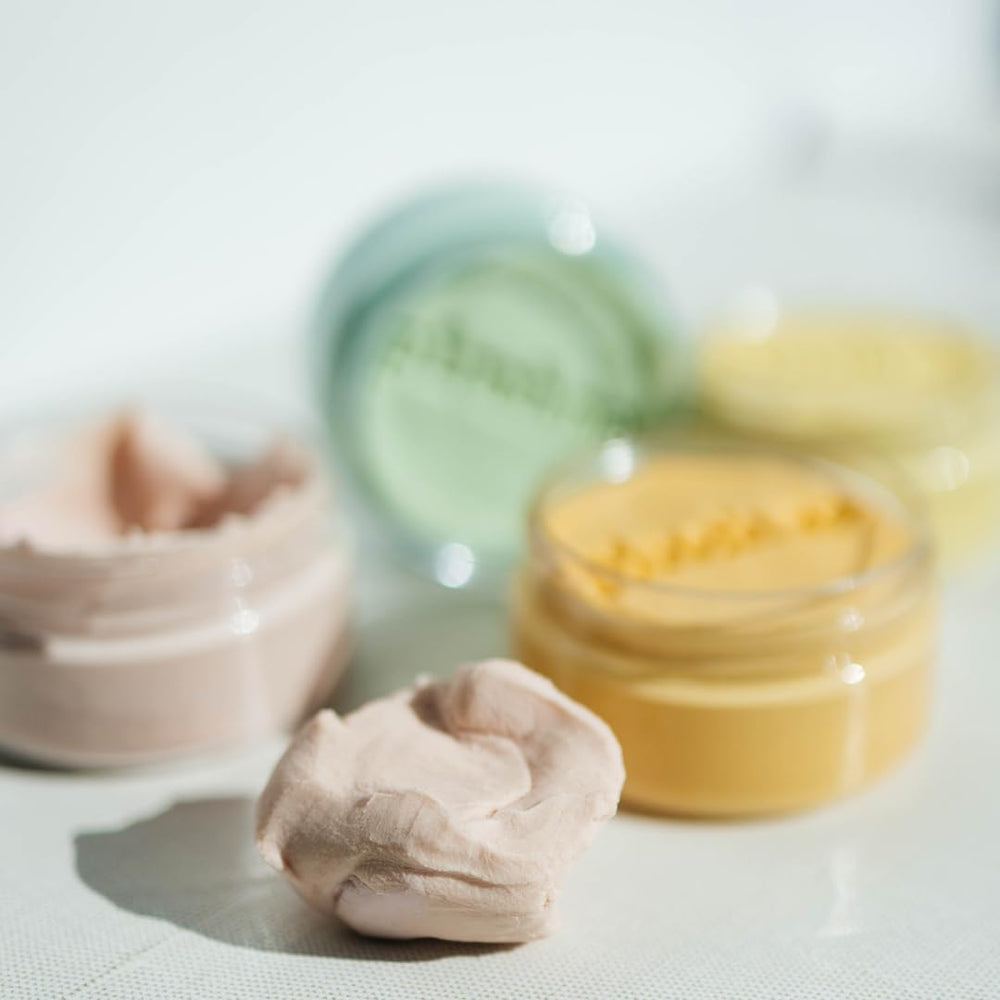 Open jar view reveals Peachy color and easy access for quick sensory resets.