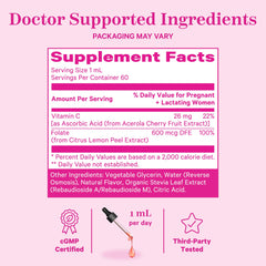 Closeup of Pink Stork Liquid Folate Drops liquid in dropper.