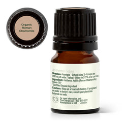 Bright scene of a diffuser with Plant Therapy Chamomile oil for calm.