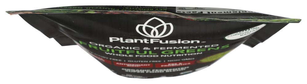 PlantFusion Fruitful Greens smoothie in glass with fresh fruit.
