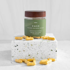 Close-up of Plexus Ease ingredient label emphasizing turmeric and bromelain components.