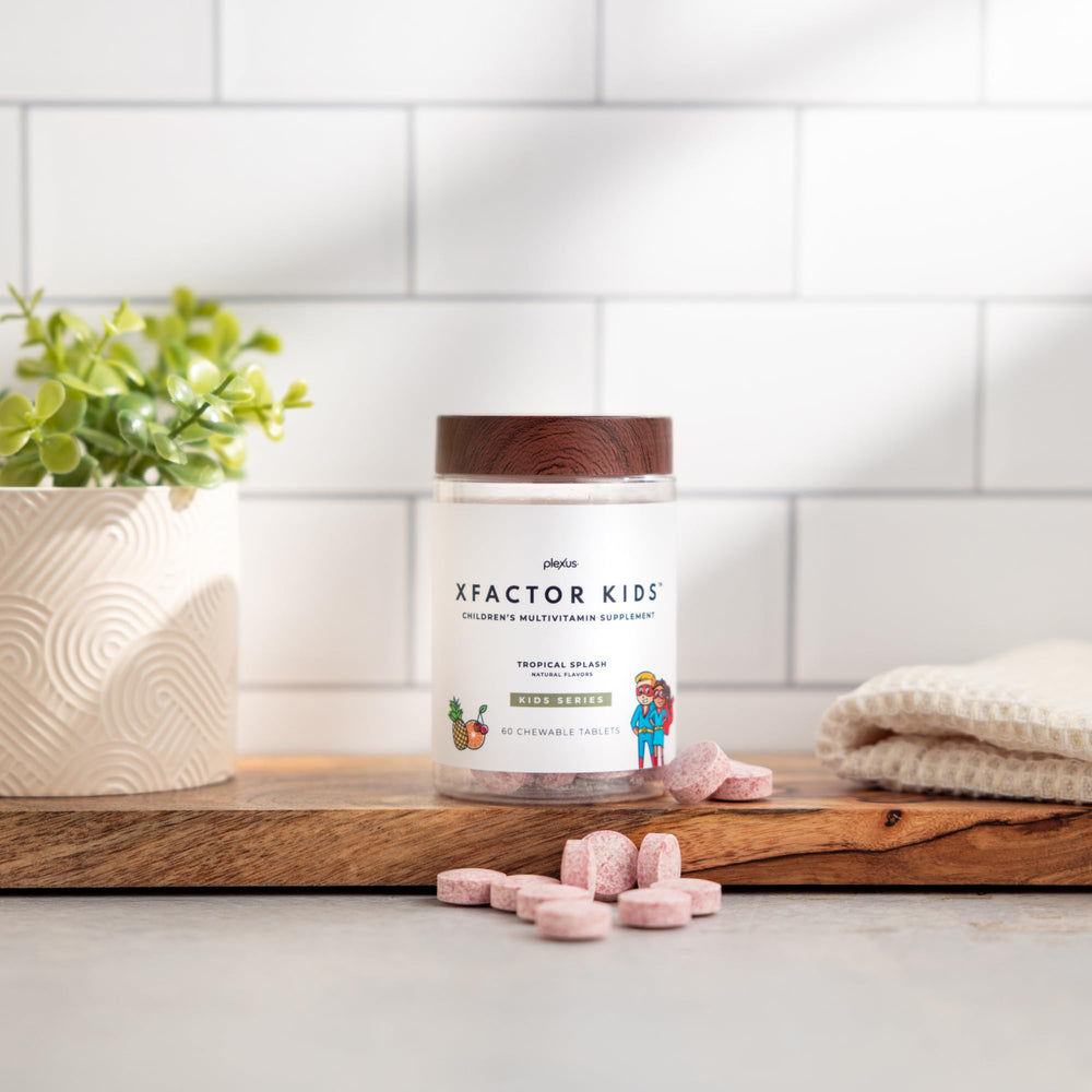 Plexus Xfactor Kids vitamin label shows 13 essential vitamins for growth.