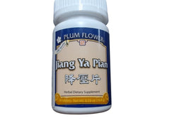 Plum Flower Jiang Ya Pian tablets in bottle, potential aid for blood pressure concerns.