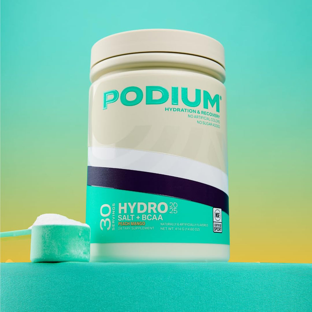 Podium Nutrition Hydro Salt glass of water ready for training session.