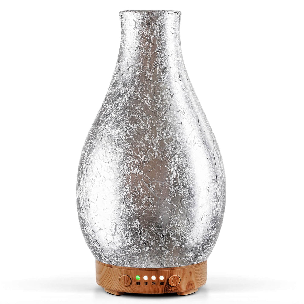 Porseme 100ml diffuser top view showcases elegant silver-plated volcano design and glass body, premium ambience