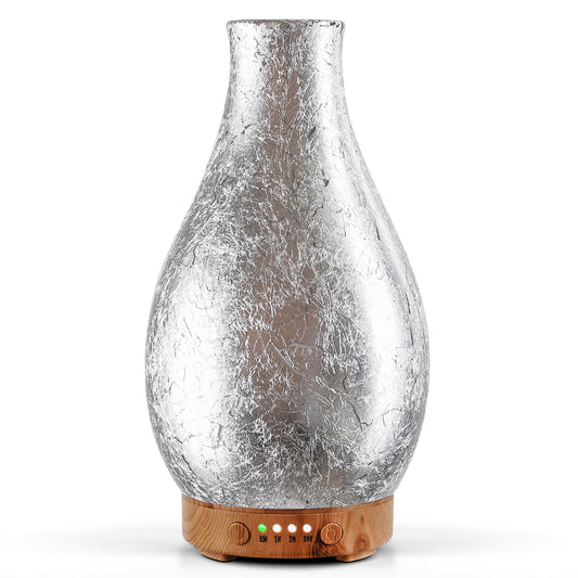 Porseme 100ml diffuser top view showcases elegant silver-plated volcano design and glass body, premium ambience