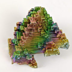 Pounique Bismuth cluster with rainbow colors enhances home ambience.