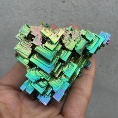 Pounique Bismuth crystal reveals triangular lattice, a striking decor piece.