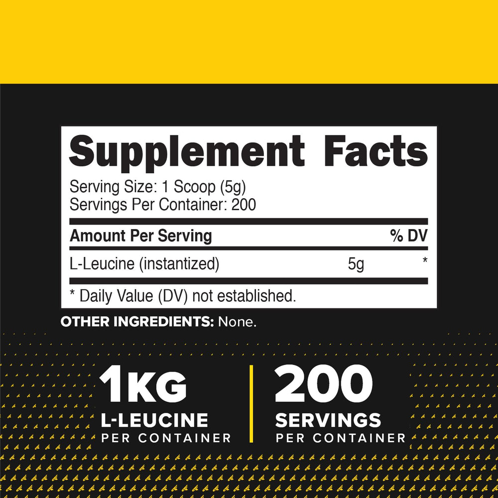 Primaforce L-Leucine powder scoop resting beside jar, indicating convenient serving size.