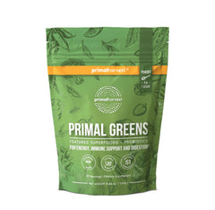 Primal Harvest Super Greens Powder tub close-up showing premium nutrition and greens