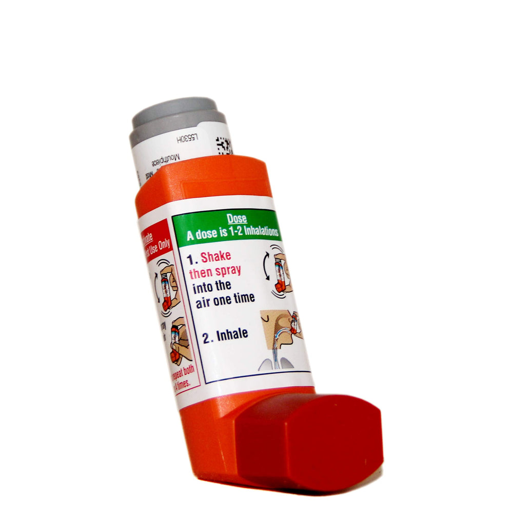 Primatene Mist inhaler ready for use, a compact relief option for mild intermittent symptoms.